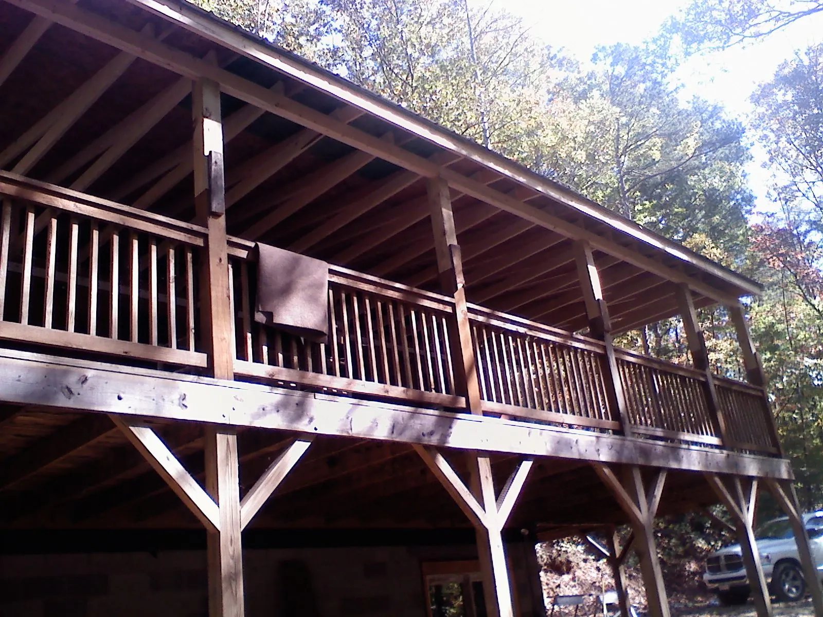Timber framing under a new elevated porch and deck — Roof Leak Repair in Gleason by Roofing Brothers